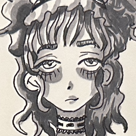 A woman dressed in a thick grey cardigan over a summer dress and fishnets.